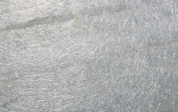 Sluggans laminate fibreglass or shingles?